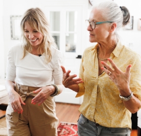 dana and woman talking
